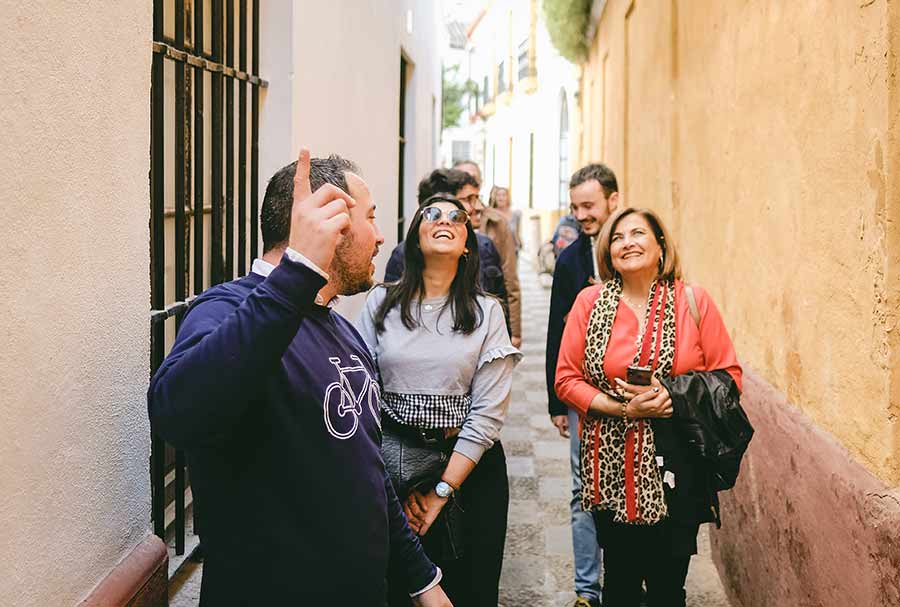Small group at a narrow street in Santa Cruz