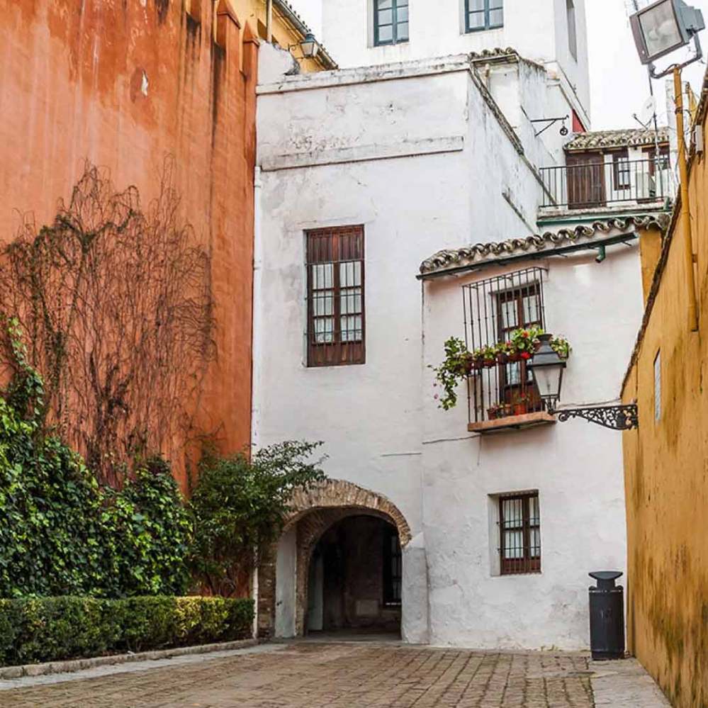 Calle judería and Alcazar walls in Seville Jewish Quarter