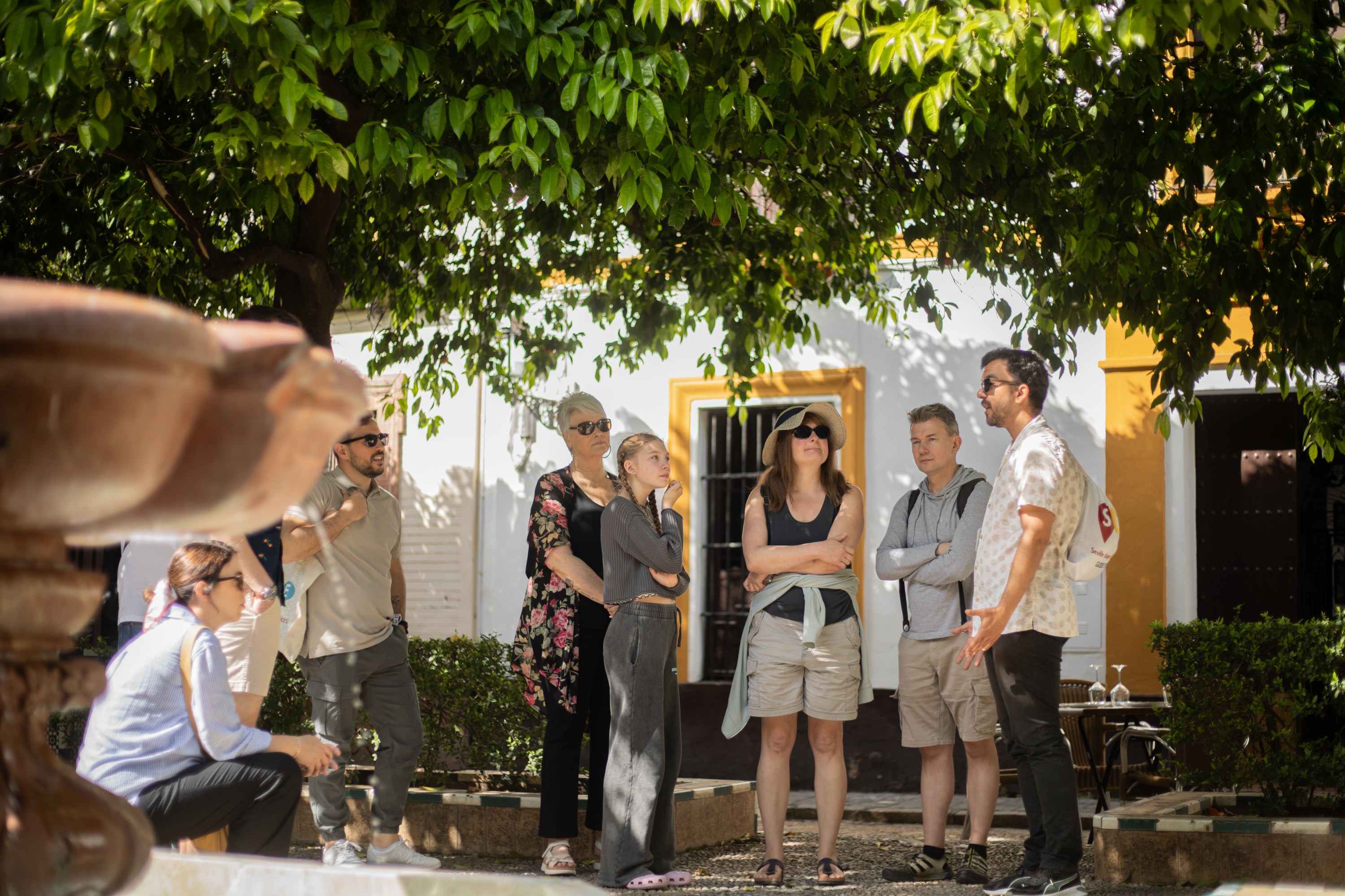 Grouo of tourist in Santa Cruz neighbourhood in Seville