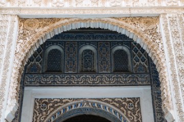 Ornate archway with intricate geometric patterns and carvings.