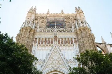 Ornate Gothic cathedral facade with intricate carvings and spires.