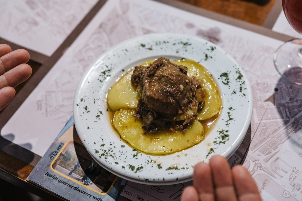 Carrillada with potatoes, a traditional tapa in Seville